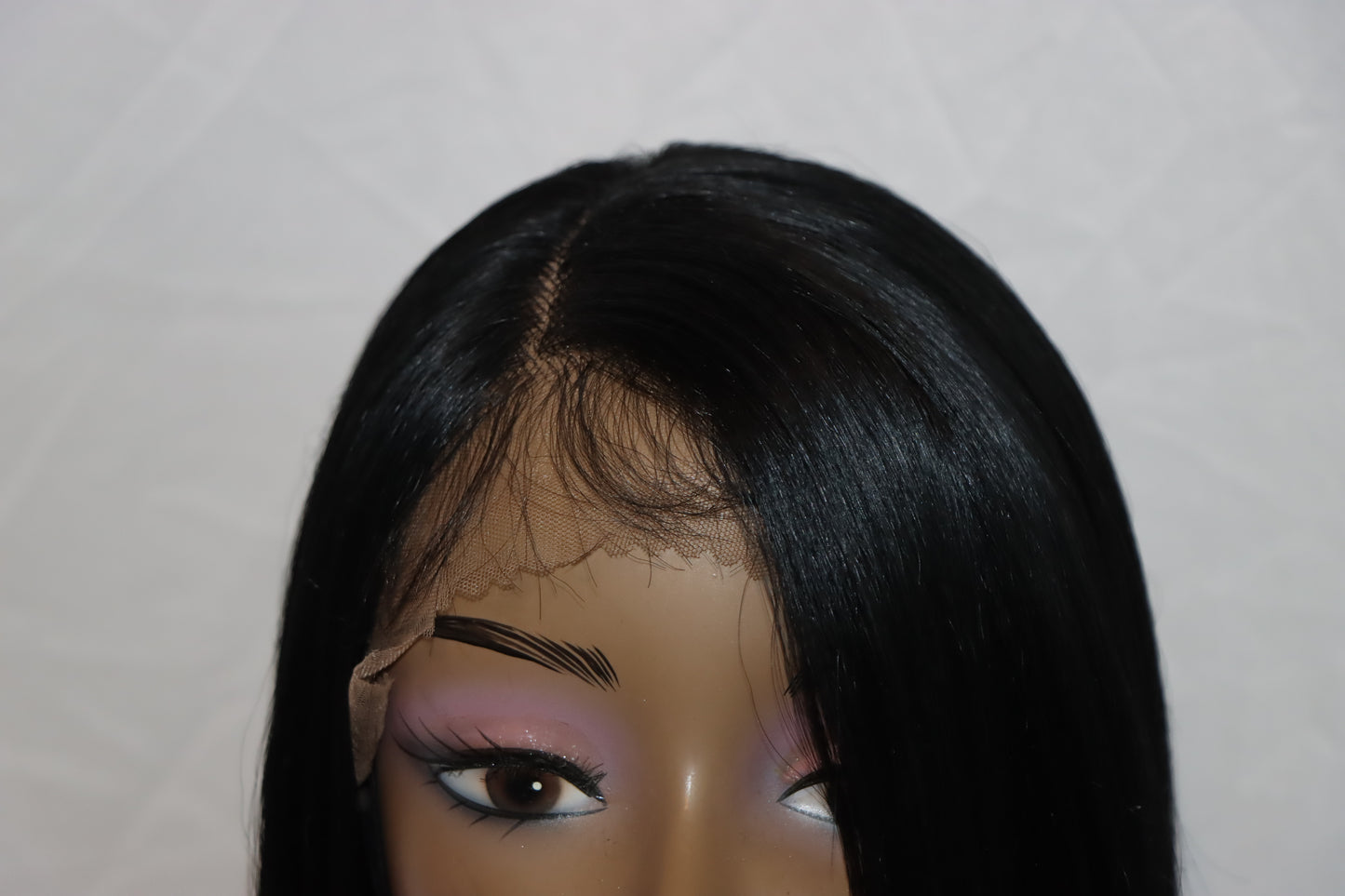 Frontal Black Bob with Plucked Side Part