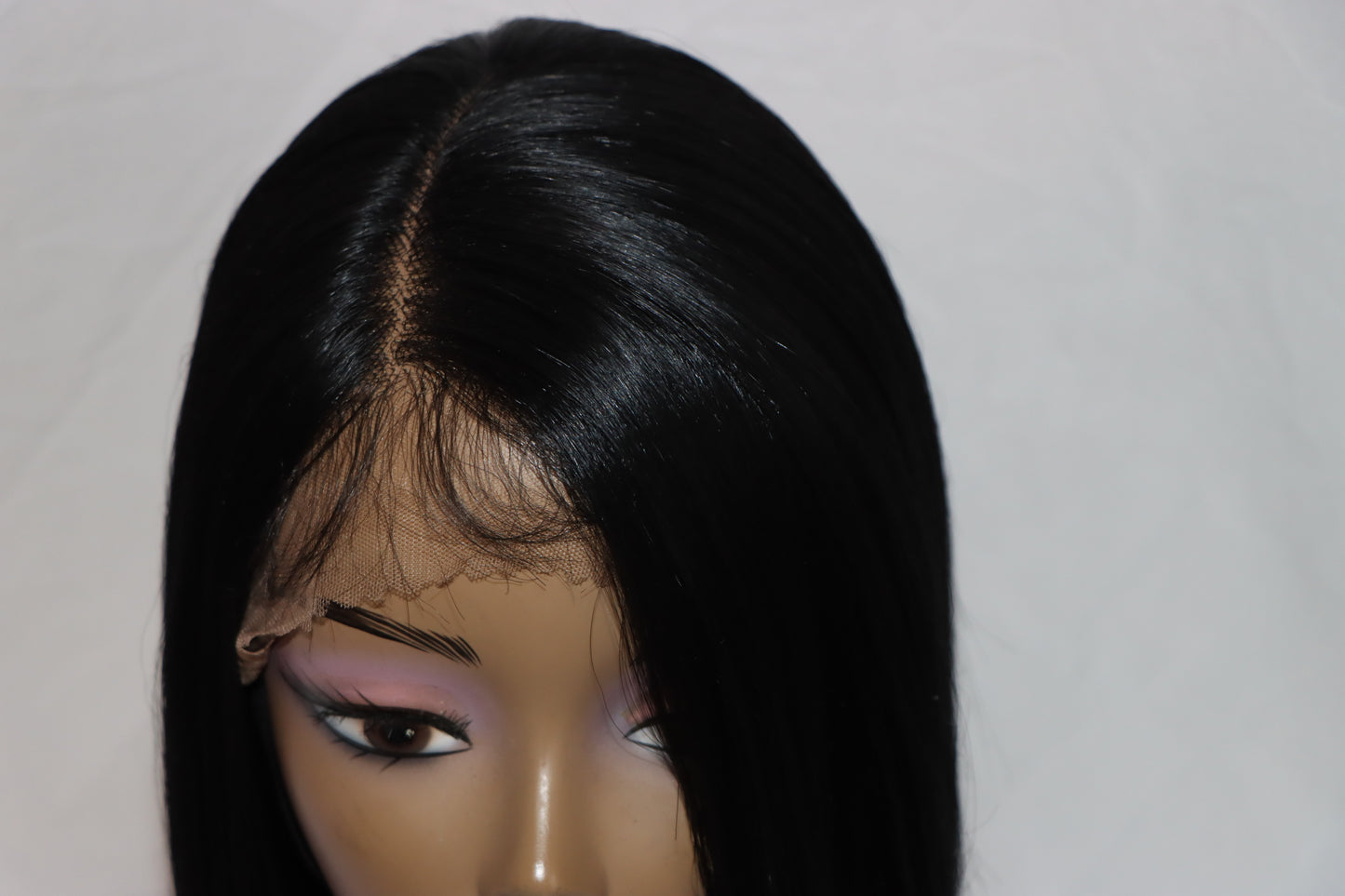 Frontal Black Bob with Plucked Side Part